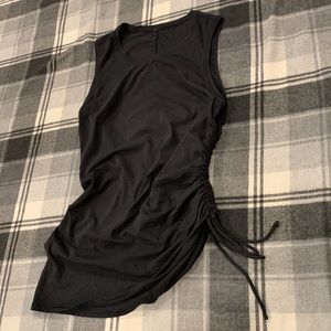 Lululemon top with drawstring side, size 4.